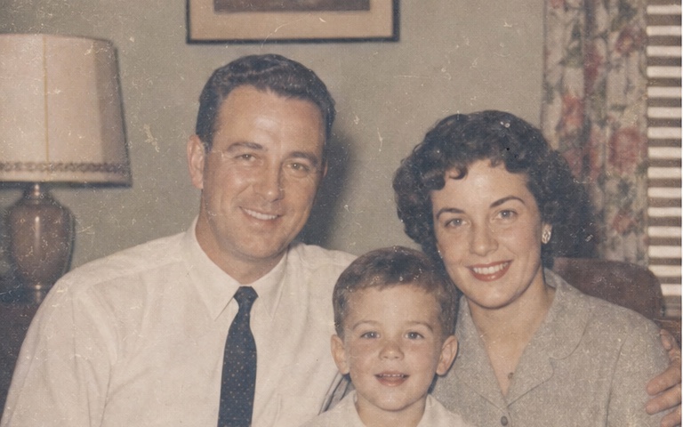 Faded soft family photo before AI restoration
